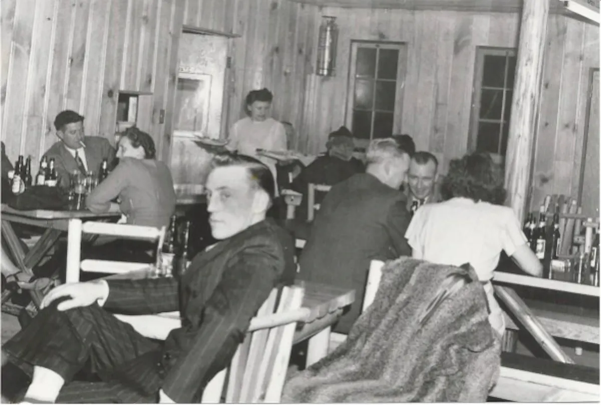 A group of people sitting on a bench